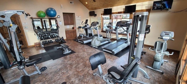 workout area featuring wood ceiling and high vaulted ceiling