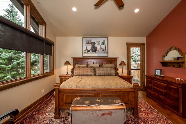 bedroom featuring lofted ceiling, dark hardwood / wood-style floors, and ceiling fan