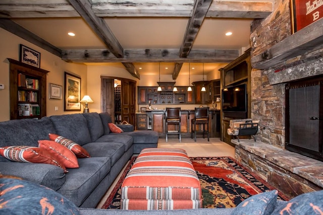 living room with beamed ceiling, carpet, coffered ceiling, and a fireplace