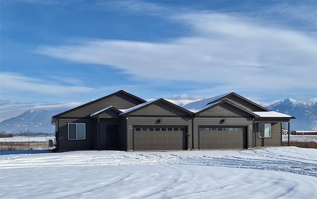 1109 Olympia Way, Kalispell, MT 59901 - single story home featuring an attached garage and a mountain view
