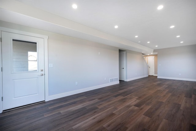 interior space with dark hardwood / wood-style flooring