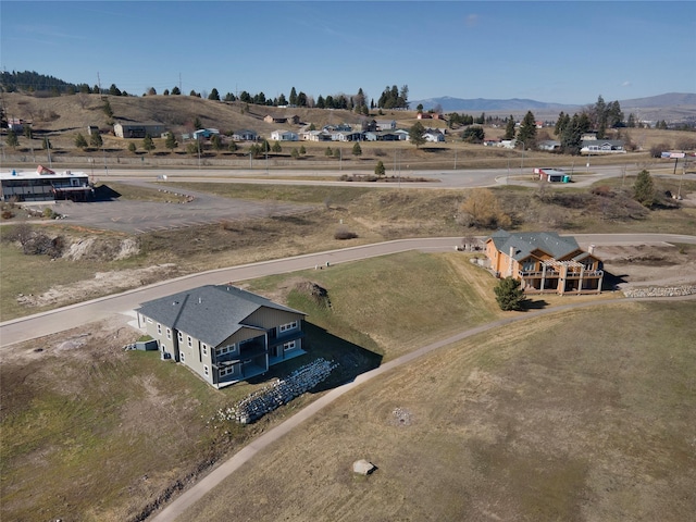 drone / aerial view featuring a mountain view