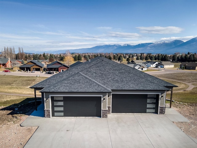 view of front of home featuring a mountain view