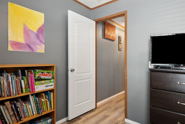 bedroom with light hardwood / wood-style floors