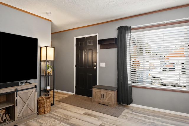 living room featuring light wood-type flooring and crown molding