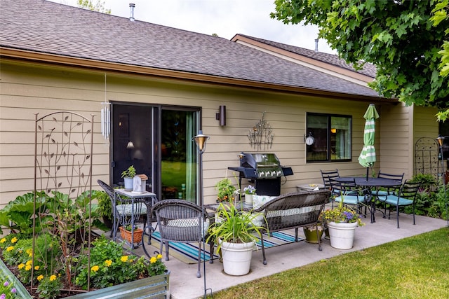 rear view of house featuring a patio area