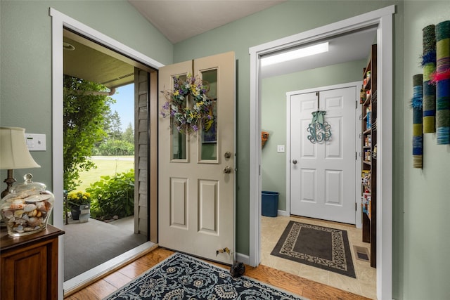 foyer entrance featuring light hardwood / wood-style flooring