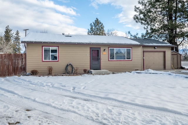 single story home with a garage