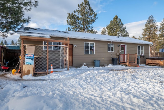 view of snow covered property