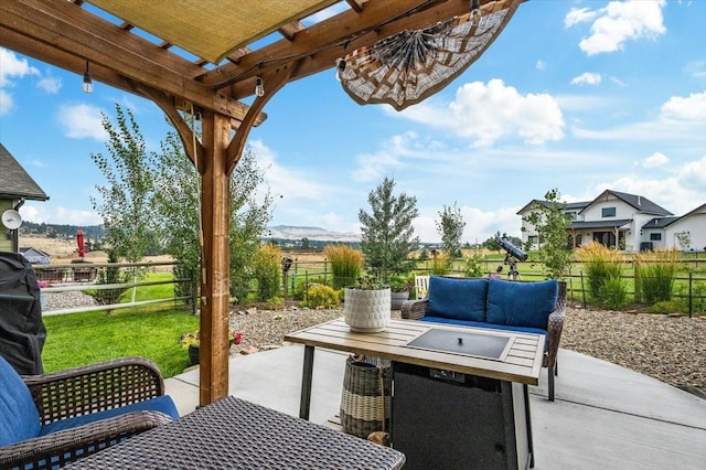 view of patio / terrace with an outdoor hangout area and a pergola