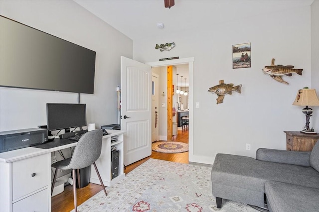 home office featuring hardwood / wood-style floors