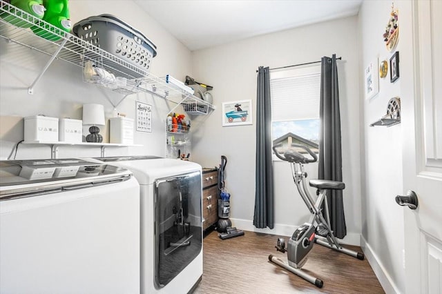 washroom with independent washer and dryer