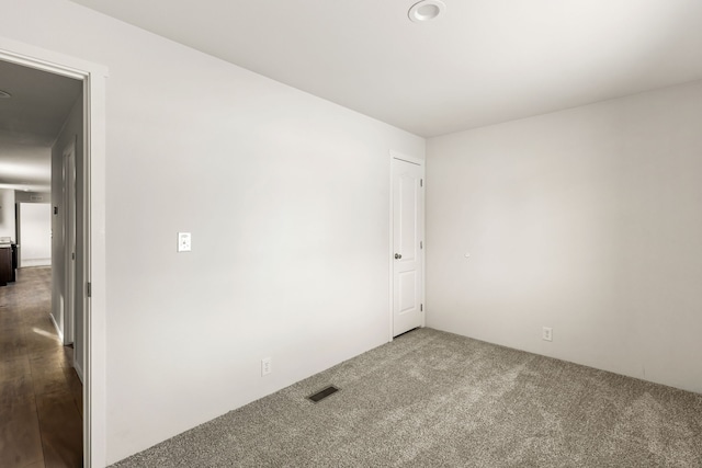 empty room featuring carpet floors