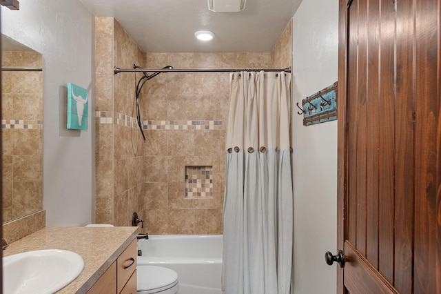 full bathroom with toilet, vanity, and shower / bath combination with curtain