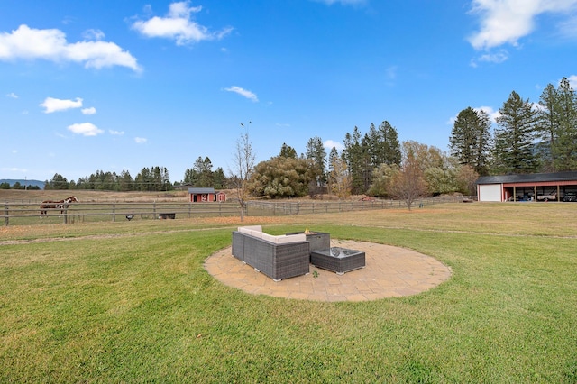 view of yard with a rural view