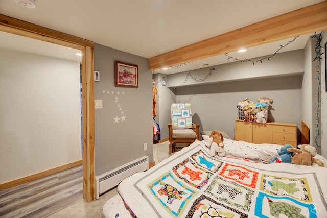 bedroom featuring a baseboard radiator