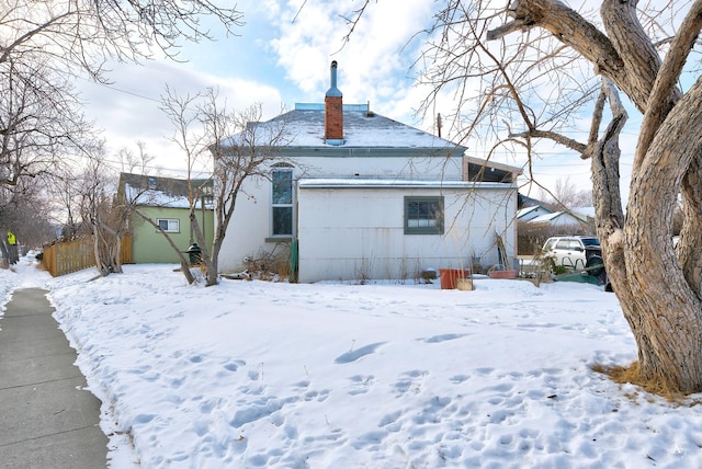 view of snow covered property