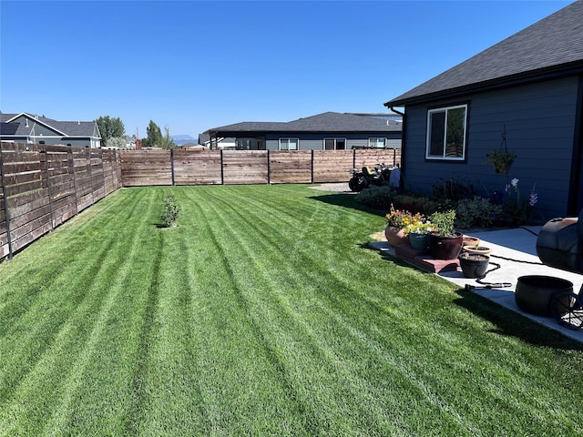 view of yard featuring a fenced backyard