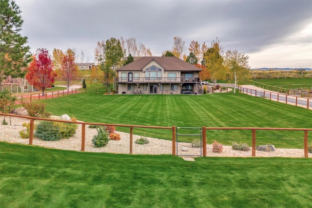 exterior space featuring a rural view and a deck