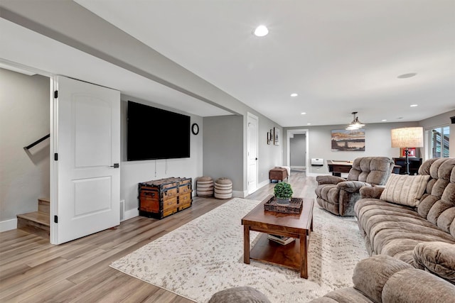 living room with light hardwood / wood-style flooring