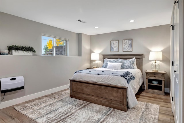 bedroom featuring light wood-type flooring