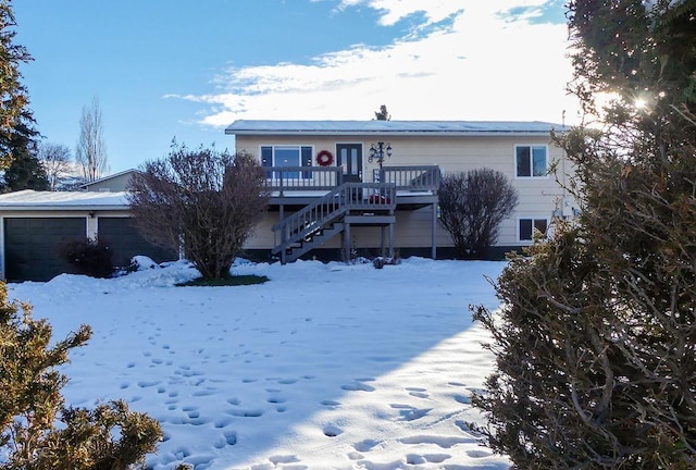 view of front of property with a deck