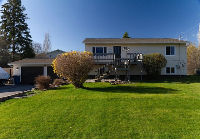 view of front of house featuring a wooden deck, driveway, a front yard, and stairs