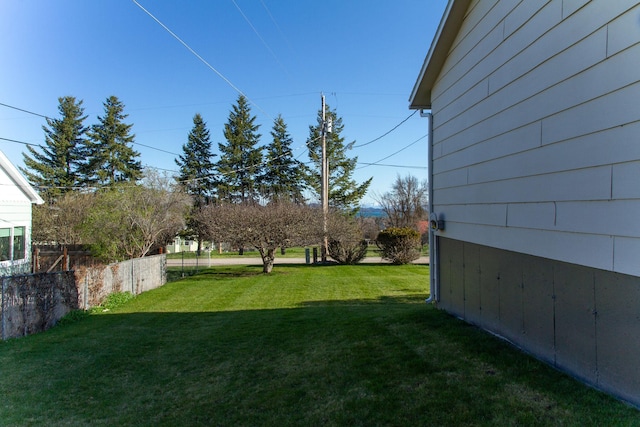 view of yard featuring fence