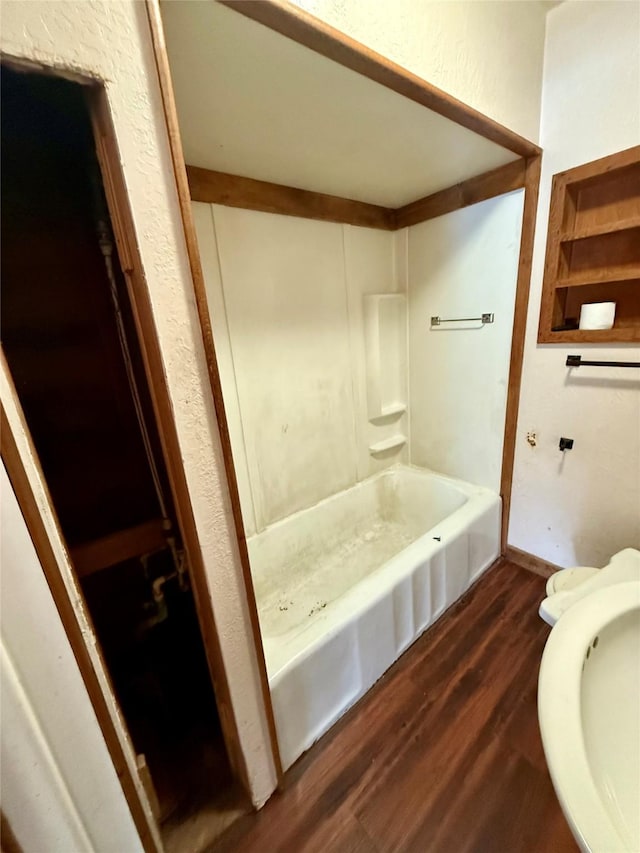 bathroom with wood-type flooring