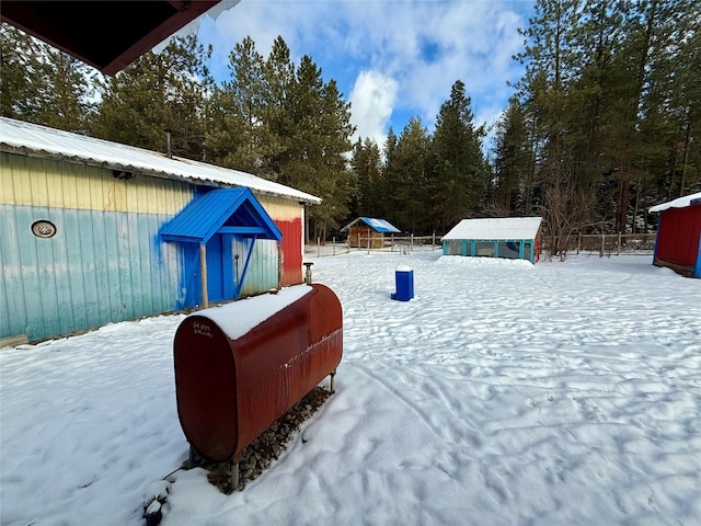 view of yard covered in snow