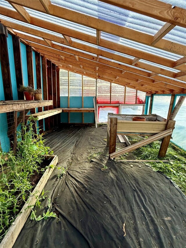 misc room featuring lofted ceiling