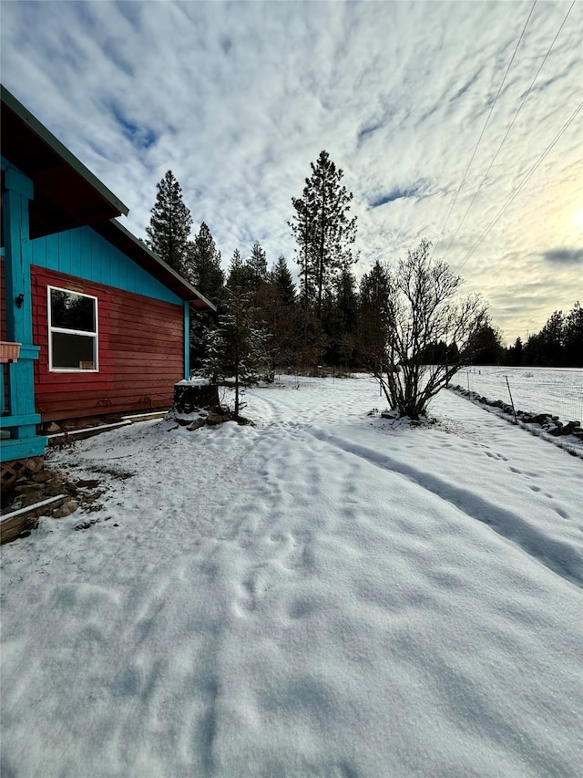 view of snowy yard