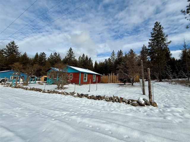 view of yard covered in snow