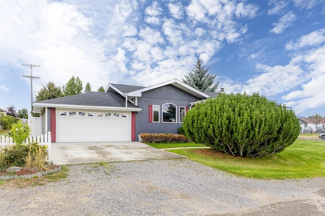 single story home featuring a garage