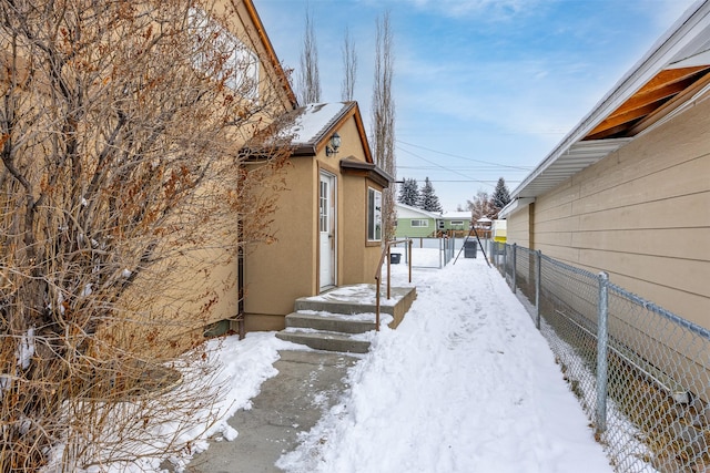 view of yard layered in snow