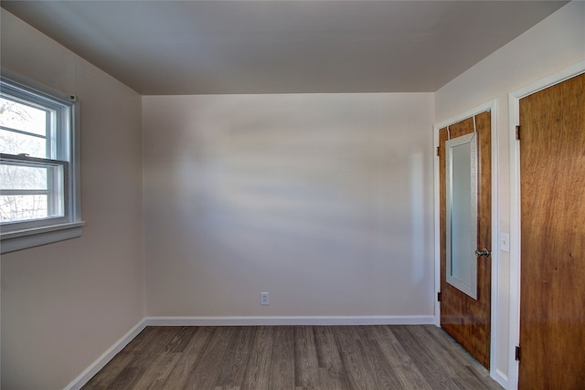 unfurnished room featuring hardwood / wood-style floors