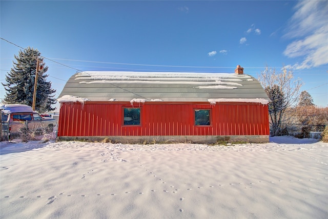 view of snow covered garage