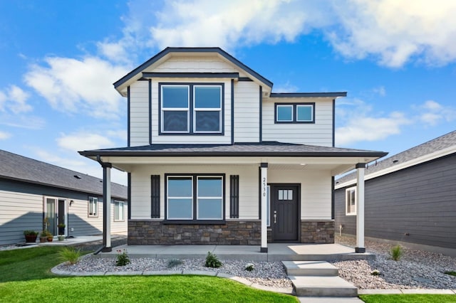 5843 Horn Rd, Missoula, MT 59808 - view of front of house featuring a porch, stone siding, and a front yard