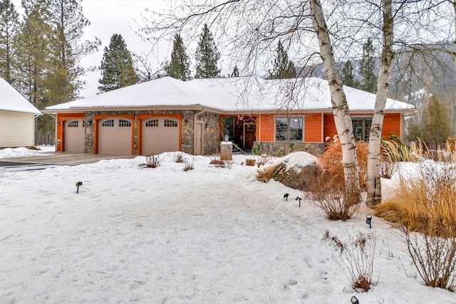 ranch-style home featuring a garage