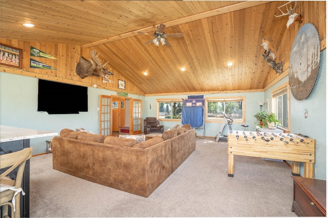 living room with ceiling fan, carpet flooring, wood ceiling, and french doors