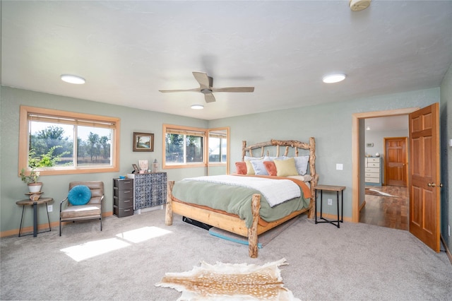 bedroom featuring ceiling fan and carpet floors