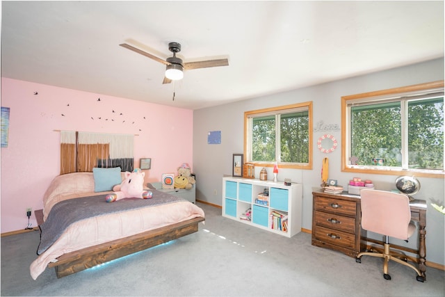 7 Hardy Cir, Ennis, MT 59729 - bedroom with an office area, carpet flooring, baseboards, and ceiling fan
