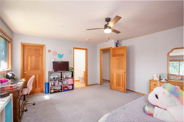 7 Hardy Cir, Ennis, MT 59729 - bedroom featuring light colored carpet, a desk, ensuite bathroom, and a ceiling fan