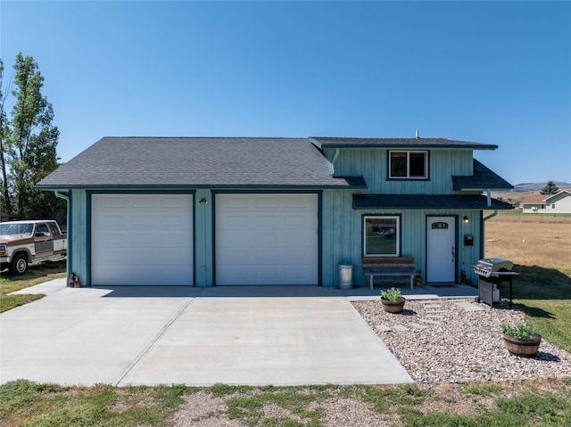 view of front facade with covered porch and a garage