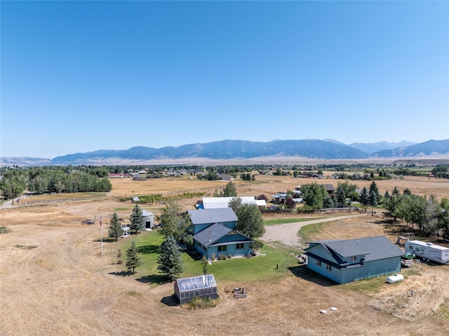 bird's eye view with a rural view and a mountain view