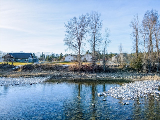 property view of water featuring a mountain view