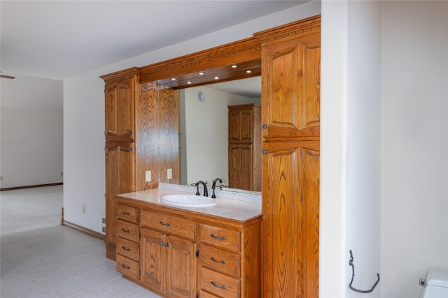 bathroom with vanity and tile patterned floors