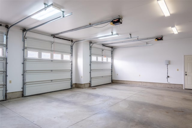 garage featuring a garage door opener