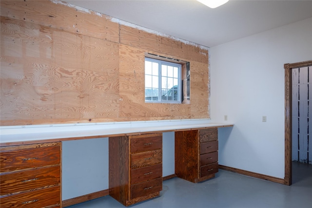 interior space featuring wood walls