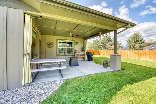 view of patio / terrace featuring ceiling fan and grilling area